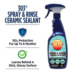 Spray-on ceramic sealant being applied to a wet vehicle surface