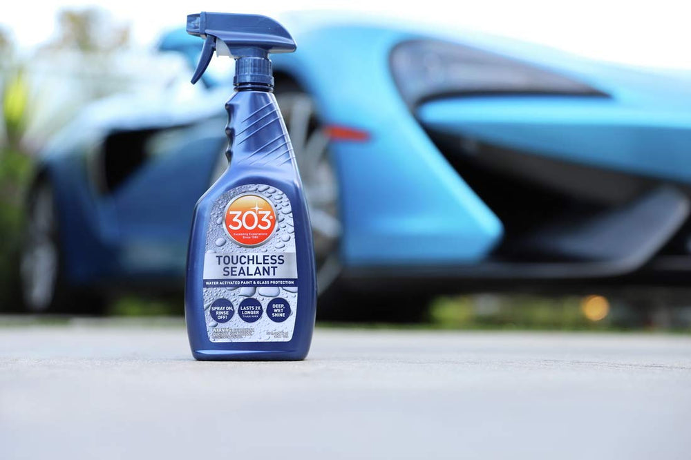Large SUV being protected by 303 Touchless Sealant spray-on application.