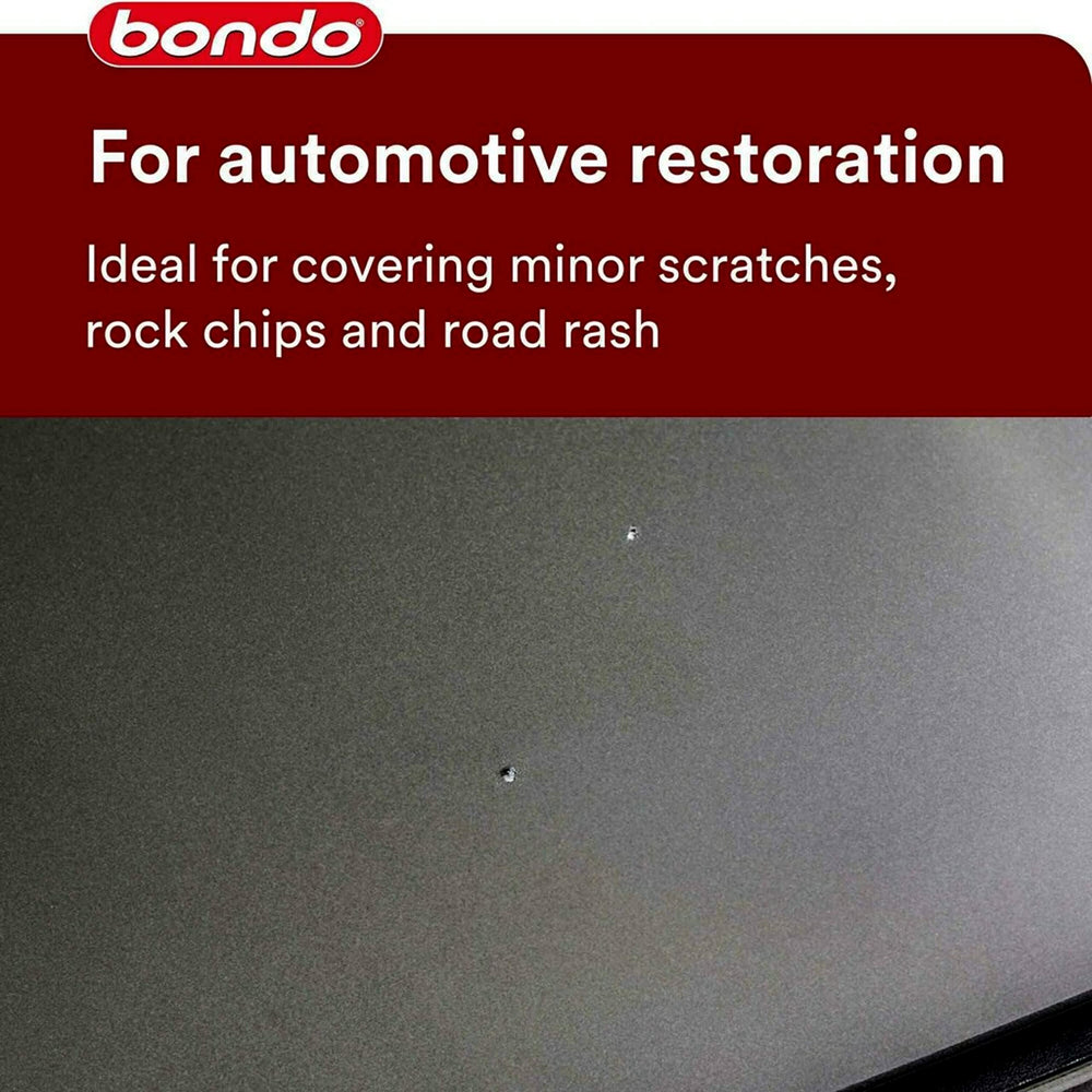 3M Bondo 907 putty repairing scratches on metal surface with a creamy, easy-to-work texture.