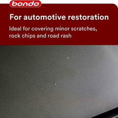 3M Bondo 907 putty repairing scratches on metal surface with a creamy, easy-to-work texture.