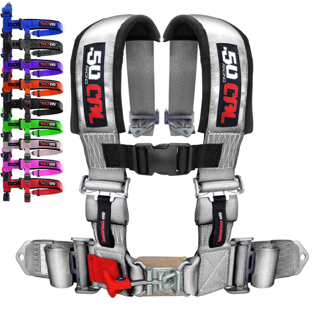 50 Caliber Racing 4-point harness anchors securely to bucket seats during high-speed off-road runs.