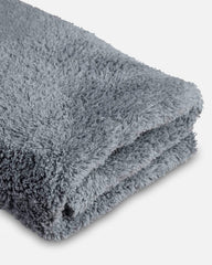 Adam's Borderless Grey Microfiber Towel dusting and drying on wheels.