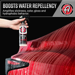 Adam's Polishes rinse aid application on car exterior shows quick use.