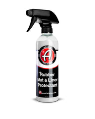 Adam's Polishes Rubber Mat & Liner Protectant bottle pouring for even application.