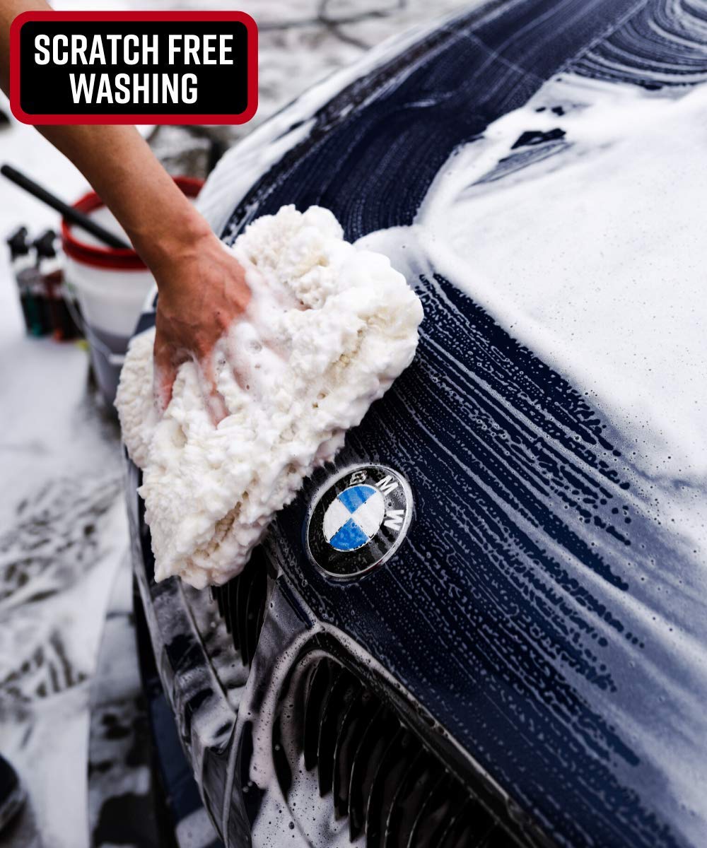 Adam's Polishes wool pad on car panel during wash.