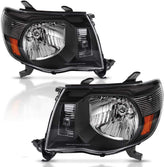 Adcarlights Toyota Tacoma driver-side headlight with black housing for enhanced night visibility.