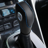 AICARS leather gear shift knob cover on Ford Focus, providing enhanced grip and refined style.