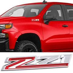 Aimoll Z71 chrome red emblem on Silverado enhances vehicle aesthetics.