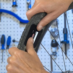 Airsnigi rubber tire patch kit packaging ready for roadside repairs