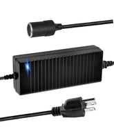 Aletbo 110V to 12V converter front view powering car devices at home.