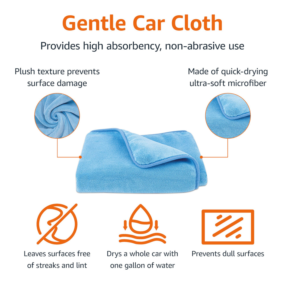 Amazon Basics microfiber car-drying towel in action on glass for lint-free shine.