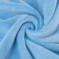 Amazon Basics plush blue towel prevents scratches during vehicle cleaning.