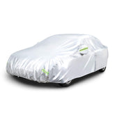 Amazon Basics Silver Weatherproof Car Cover on a sedan protects from sun and debris.