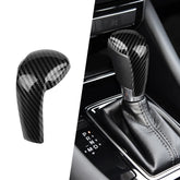 ANFOKAS gear shift knob cover closeup with glossy carbon fiber finish