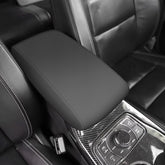 AOMSAZTO black leather armrest cover for Grand Cherokee 2011-2021 protects the console surface.