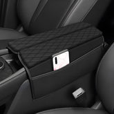 AOMSAZTO Rogue armrest cover in black leather protects the center console.