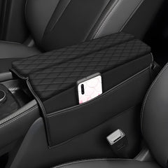 AOMSAZTO Rogue armrest cover in black leather protects the center console.