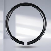 Aotoyou carbon fiber steering wheel cover clip-on installation for quick protection.