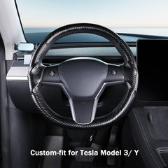 Aotoyou matte black steering wheel cover on Model 3/Y for a seamless look.