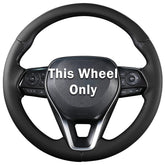 Aotoyou steering wheel cover on Toyota Corolla showing perforated black leather for improved grip and style