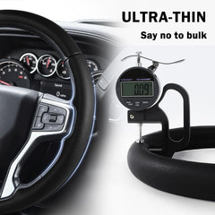 Aotoyou steering wheel cover on Tahoe for better steering control.