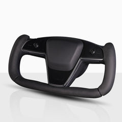 Aotoyou Tesla Yoke steering wheel cover installed, improves grip and comfort on daily drives.