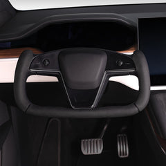 Close-up of the Aotoyou cover showing precise fit on the Tesla Yoke steering wheel.