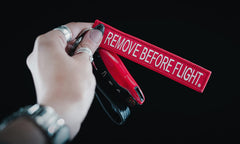 AIXEPA double-sided embroidery keychain with merrowed border for durability.