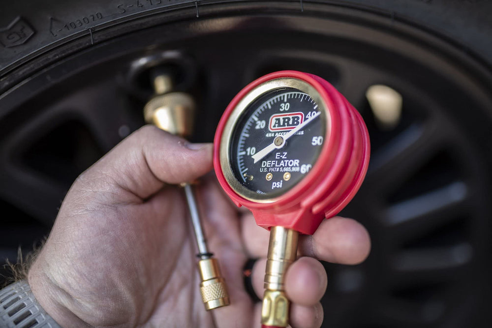 ARB505 Deflator Kit in action on off-road trail showing compact kit.