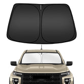 ARISMOTOR Canyon windshield sunshade folded for easy storage.