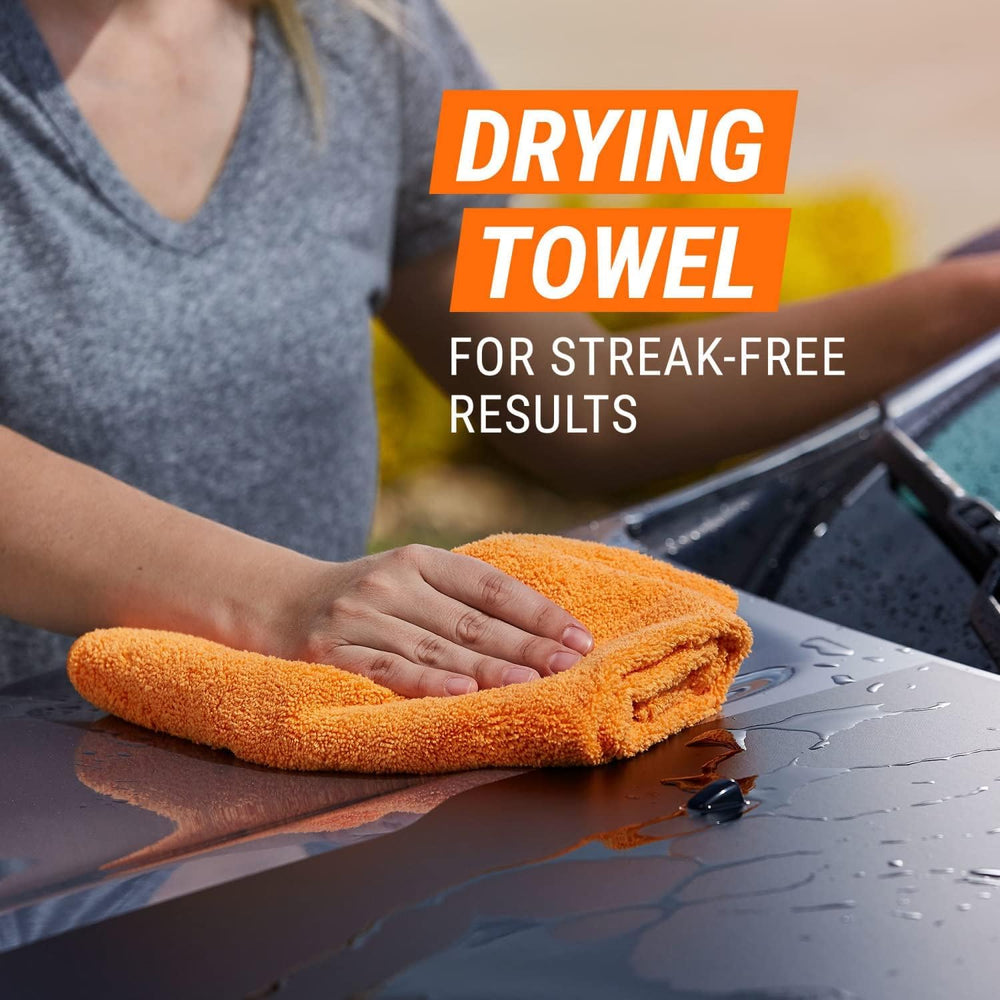 Armor All microfiber towel drying a vehicle surface safely.
