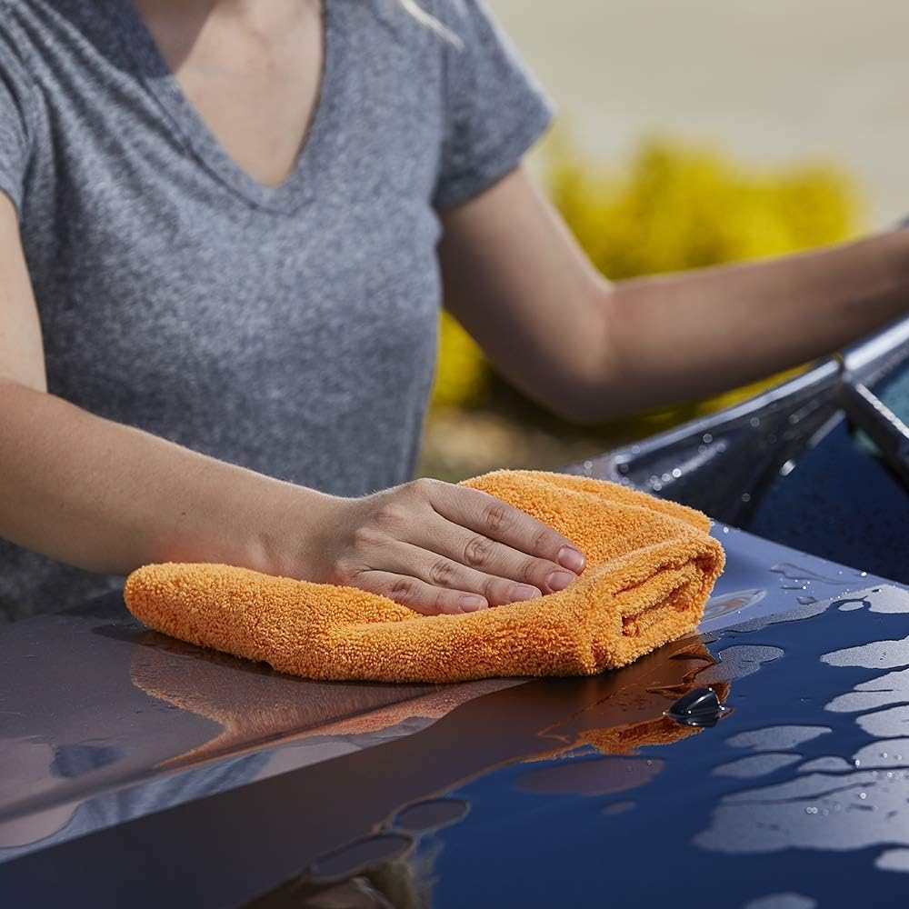 Armor All car wash kit in action during exterior cleaning.