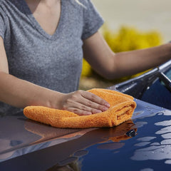 Armor All car wash kit in action during exterior cleaning.
