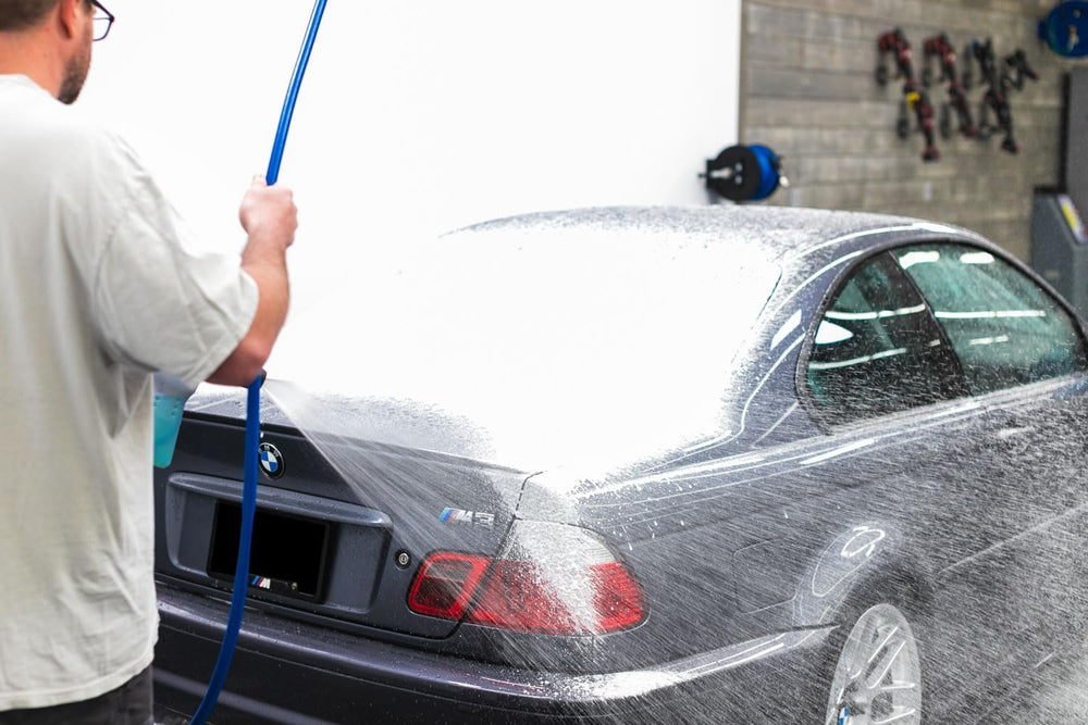 Armour Detail Supply Shampoo+ bucket-wash-ready setup on coated panel