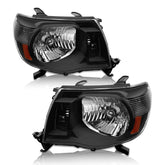 AS Tacoma headlight assembly with black housing and amber reflector improves nighttime visibility.