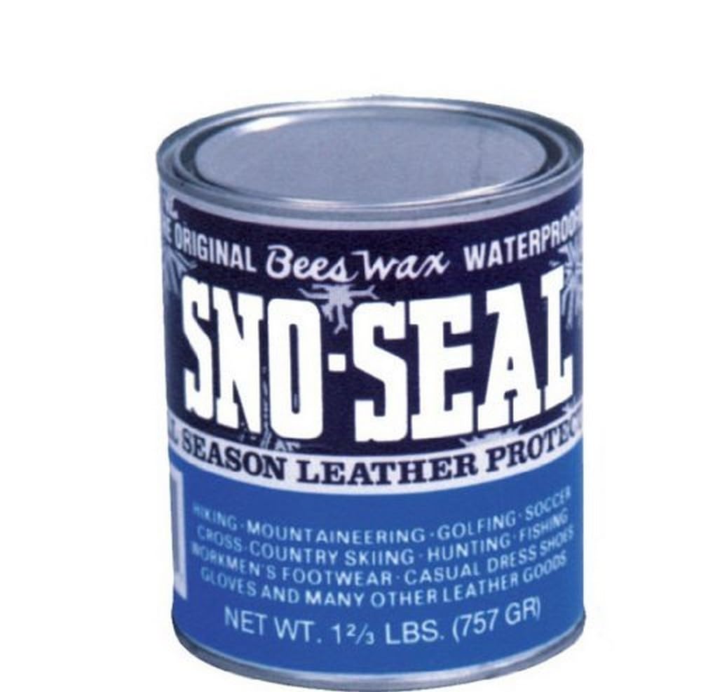 Atsko Sno-Seal Original Beeswax Waterproofing on leather boots protects against rain and snow.
