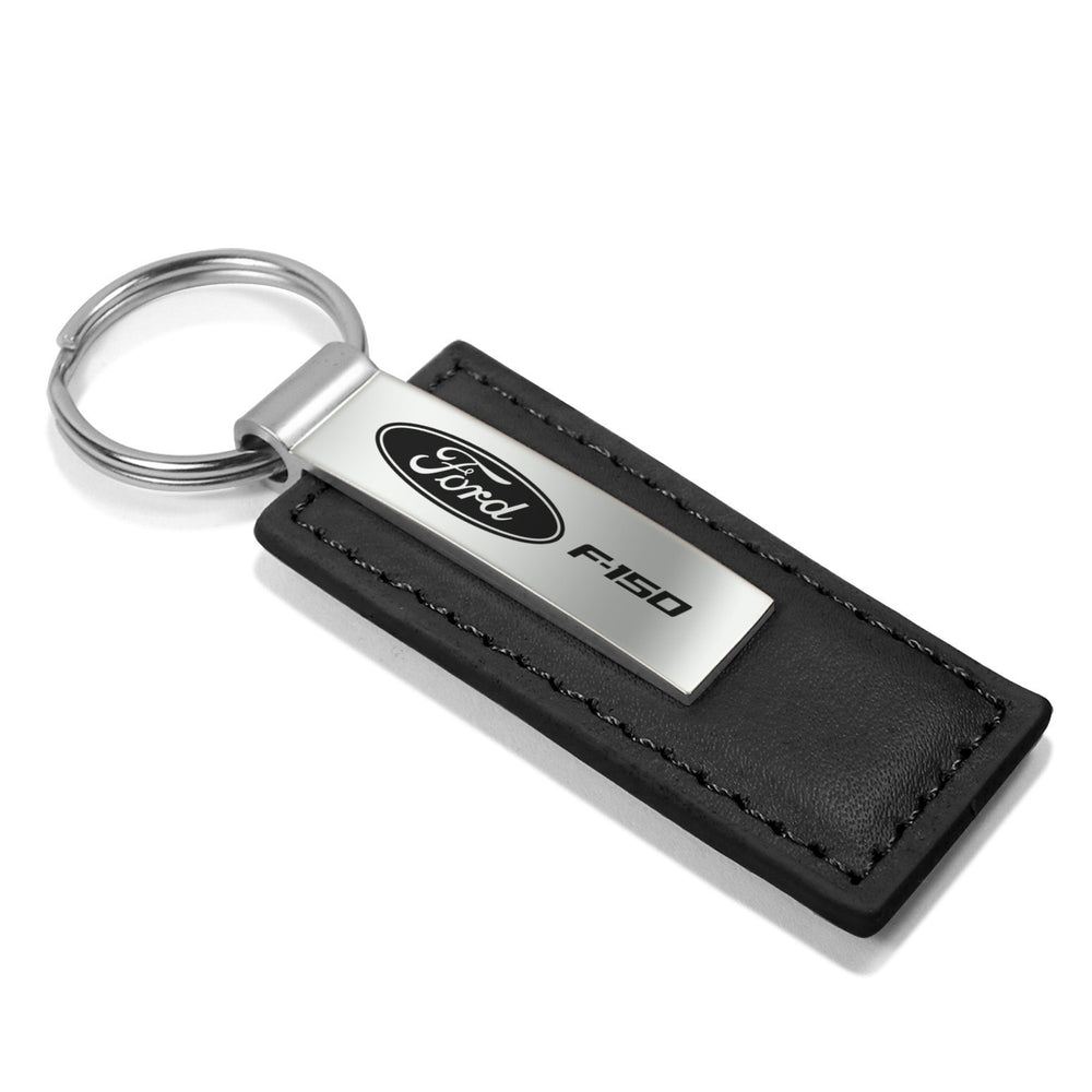 AU-TOMOTIVE GOLD F-150 silver plate laser-engraved logo for lasting shine.