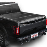 Aurorasters low-profile tri-fold F-150 front view shows all-weather cargo protection.