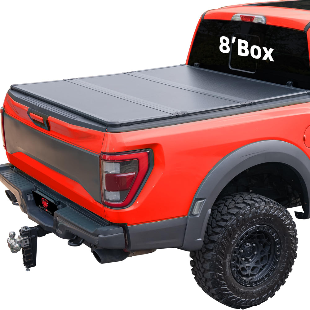 AutoBull hard-top tri-fold cover on Ram 8ft bed, front view for secure cargo.