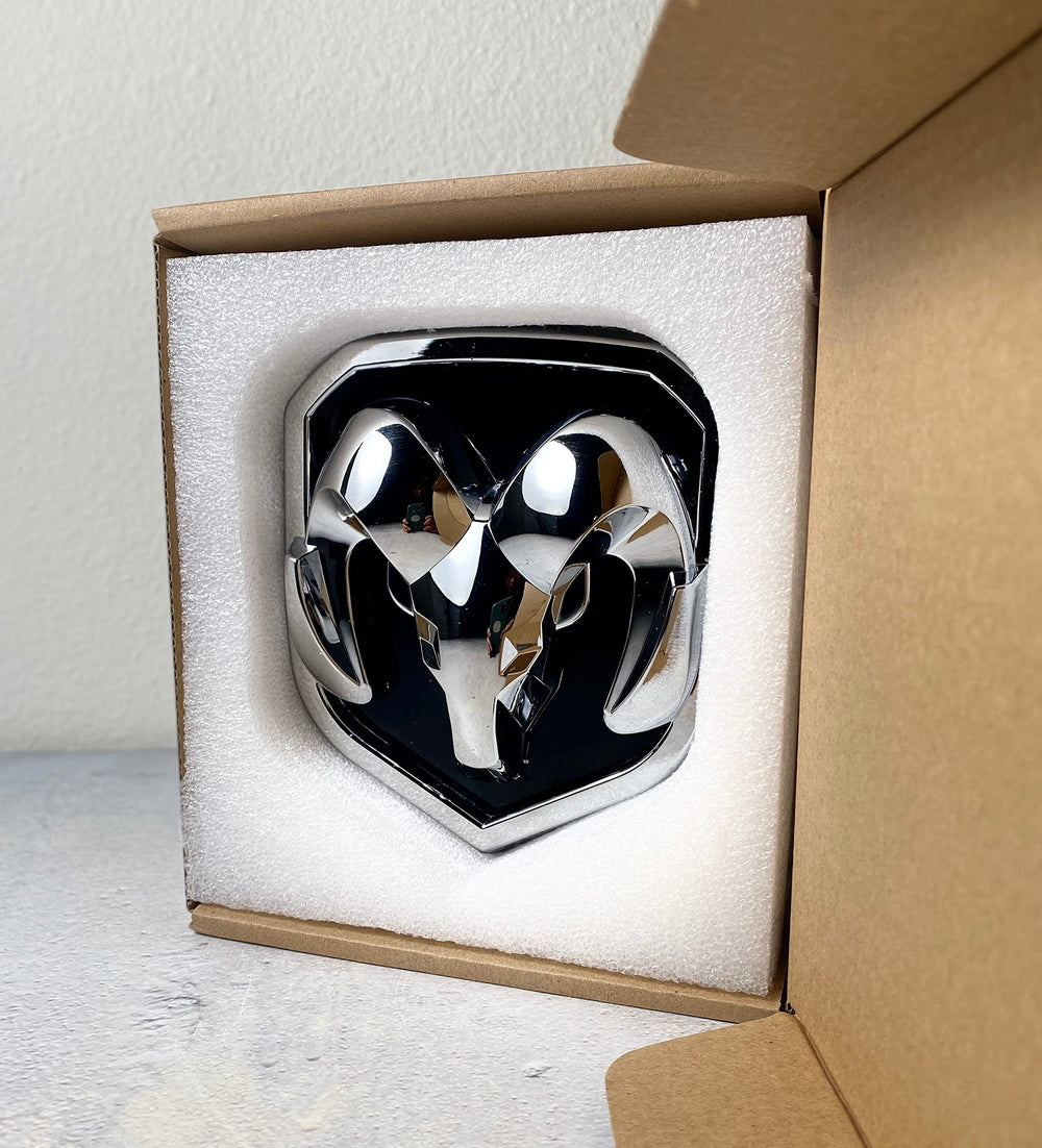 Autogem chrome emblem close-up highlighting high-gloss chrome coating.