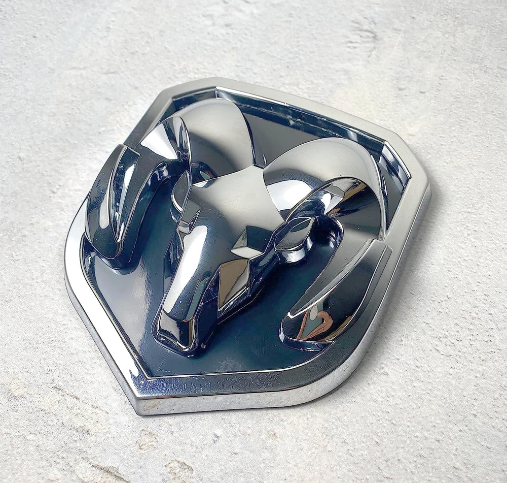 Autogem chrome RAM grille emblem with mirror finish for bold front-end look.