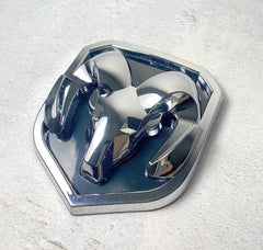 Autogem chrome RAM grille emblem with mirror finish for bold front-end look.