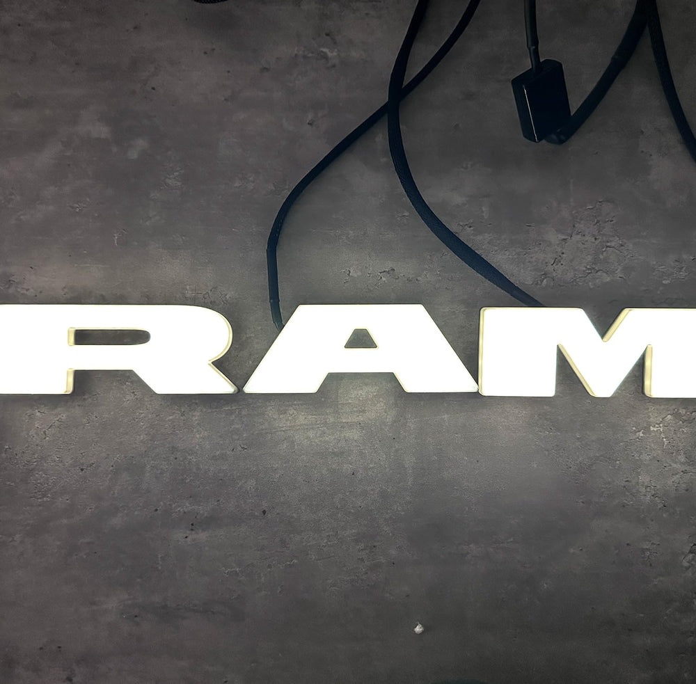 Autogem lighted grille emblem on RAM front view enhances daytime and nighttime visibility