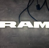 Autogem lighted grille emblem on RAM front view enhances daytime and nighttime visibility