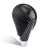 AUTOKAY carbon fiber gear shift knob close-up on a Lexus, highlighting premium grip.