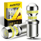 AUXITO 1156 LED bulb with projector backup light for brighter reversing visibility.