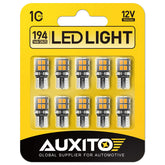 AUXITO 194 amber yellow LED bulb close-up showing 14 SMD LEDs for bright dome light