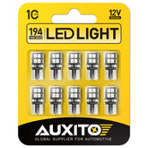 AUXITO 194 LED blue bulb closeup showing uniform 360° brightness for car interior use