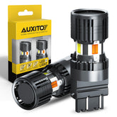 AUXITO 3157 switchback bulbs show amber and white dual colors for clear signaling.