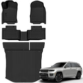 Auxko all-weather floor mats in front view showing precise fit for Jeep Grand Cherokee.